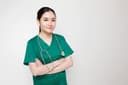 Portrait of a nurse in green scrubs